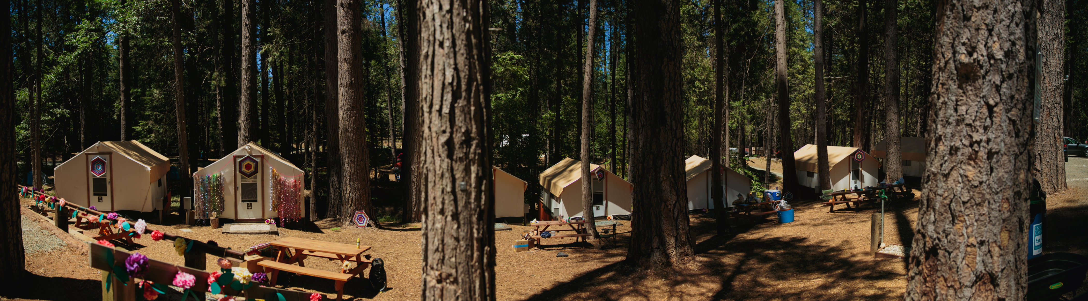 A pano of a row of cabins at the Inn Town Campground.